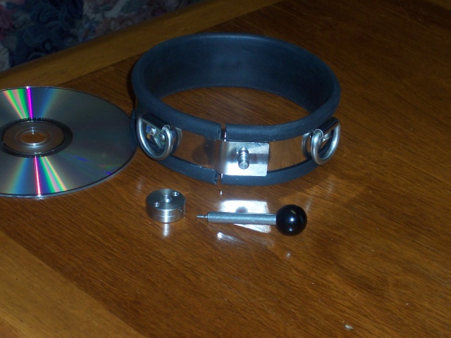 The collar, closed, with the lock-button removed to show the pin.