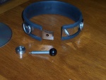 Open.  It's surprisingly strong metal.  The little tool is required to remove the lock.