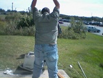 What you can't see in this picture is the cement brick John is tossing at the thing.